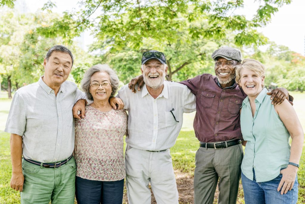Group of seniors with carer