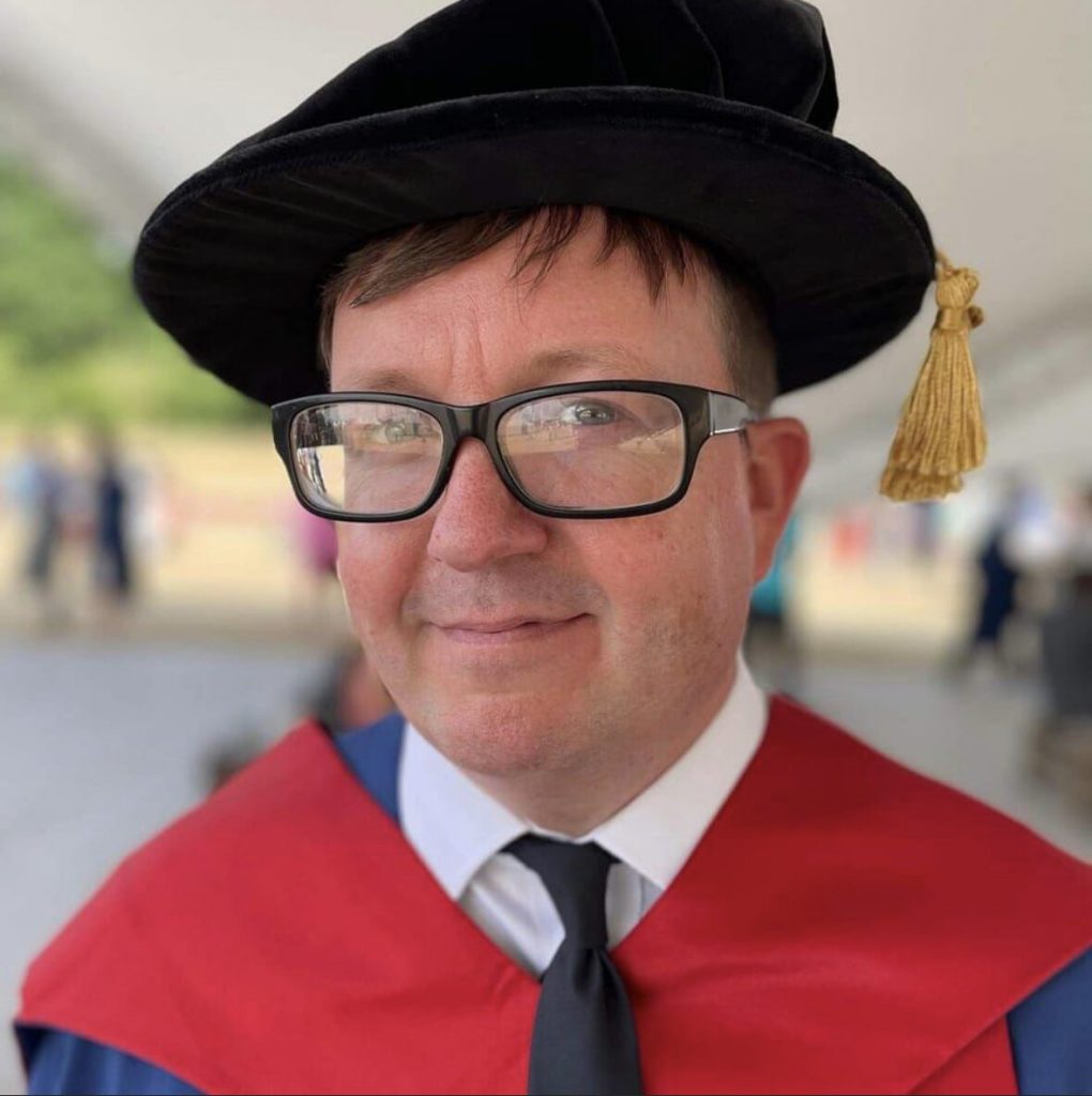 Dr Gregory in graduation robes