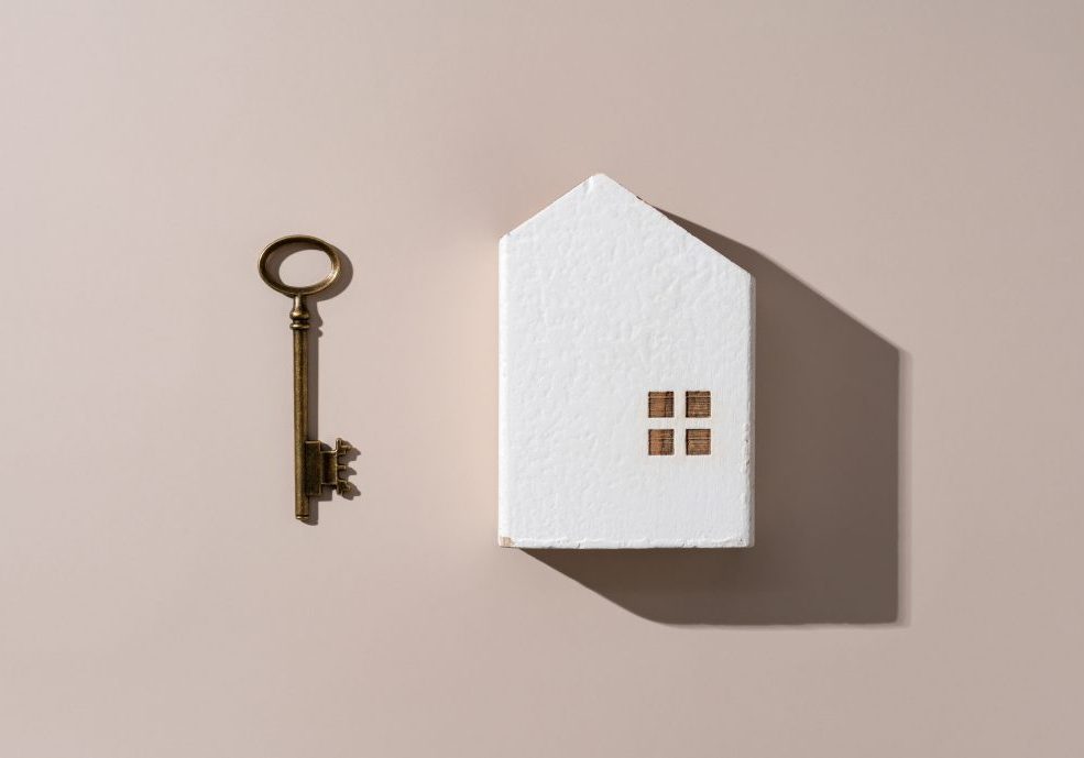Model,Of,A,House,With,Brass,Keys,Placed,On,A Model,Of,A,House,With,Brass,Keys,Placed,On,A